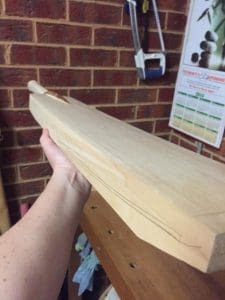 The custom made bat after Clare Johnston has fitted the handle to the cleft